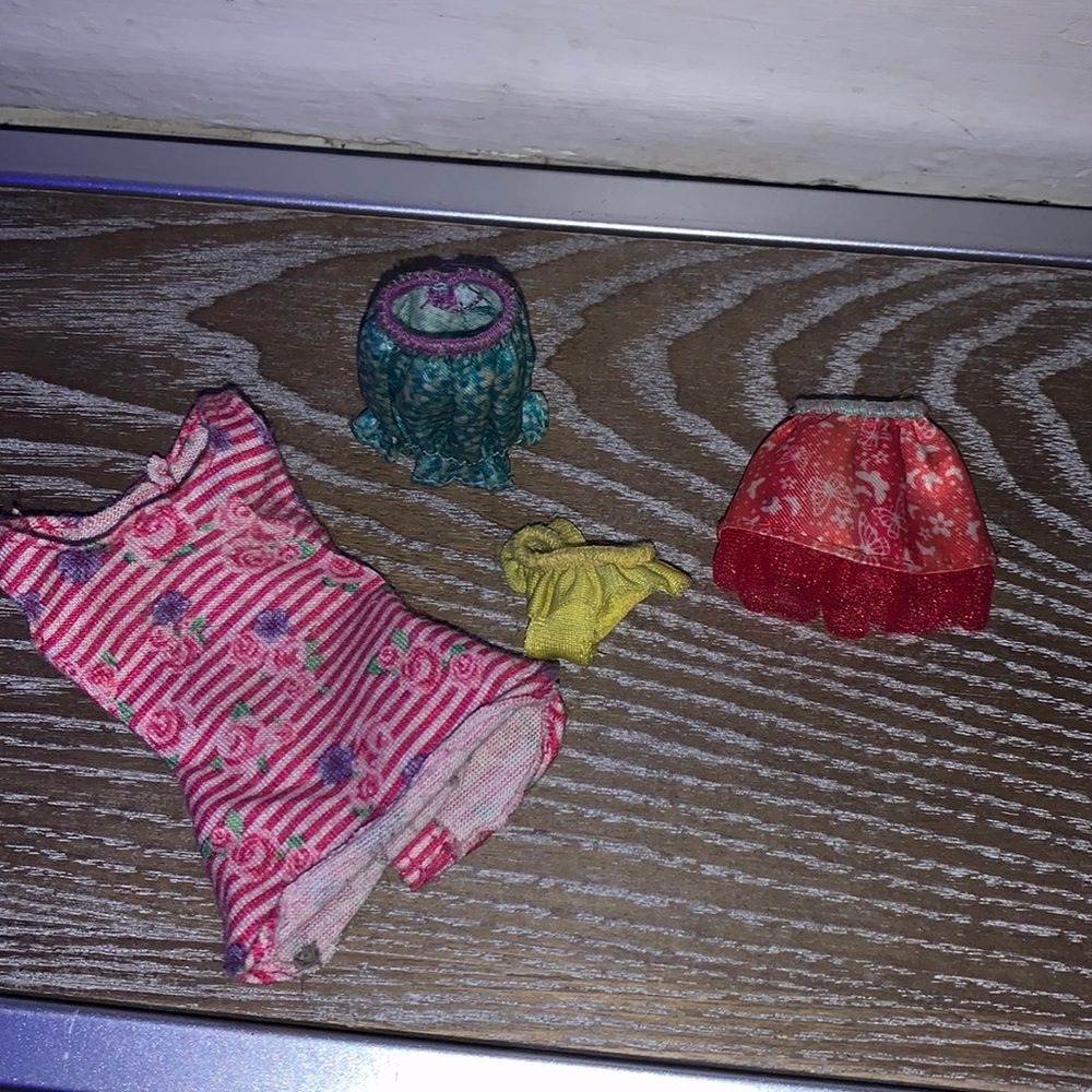 Barbie clothes! mainly chelsea doll clothes has one barbie shirt